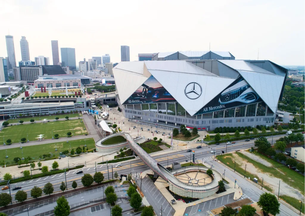 Aerial view of Mercedes-Benz Stadium in downtown Atlanta, the premier venue for large-scale corporate events and private stadium celebrations designed by DJ Knotts.