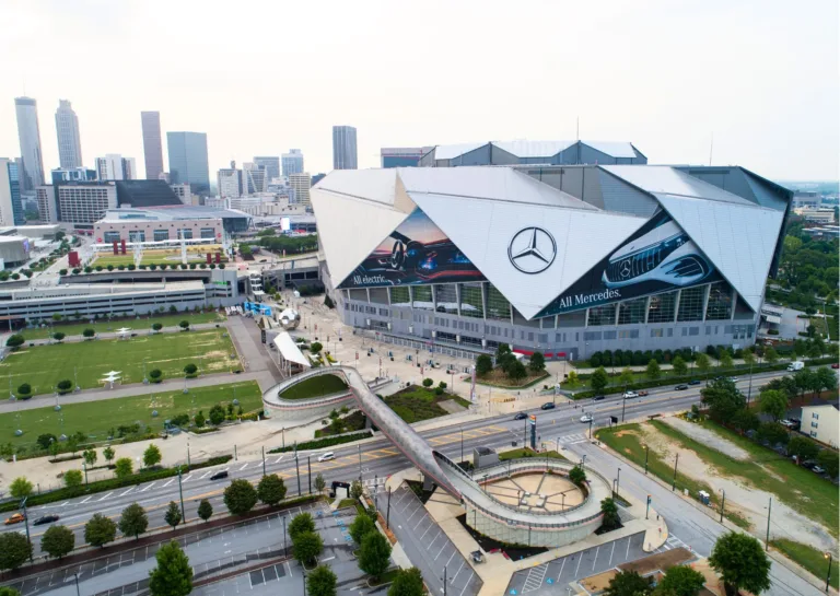 Aerial view of Mercedes-Benz Stadium in downtown Atlanta, the premier venue for large-scale corporate events and private stadium celebrations designed by DJ Knotts.